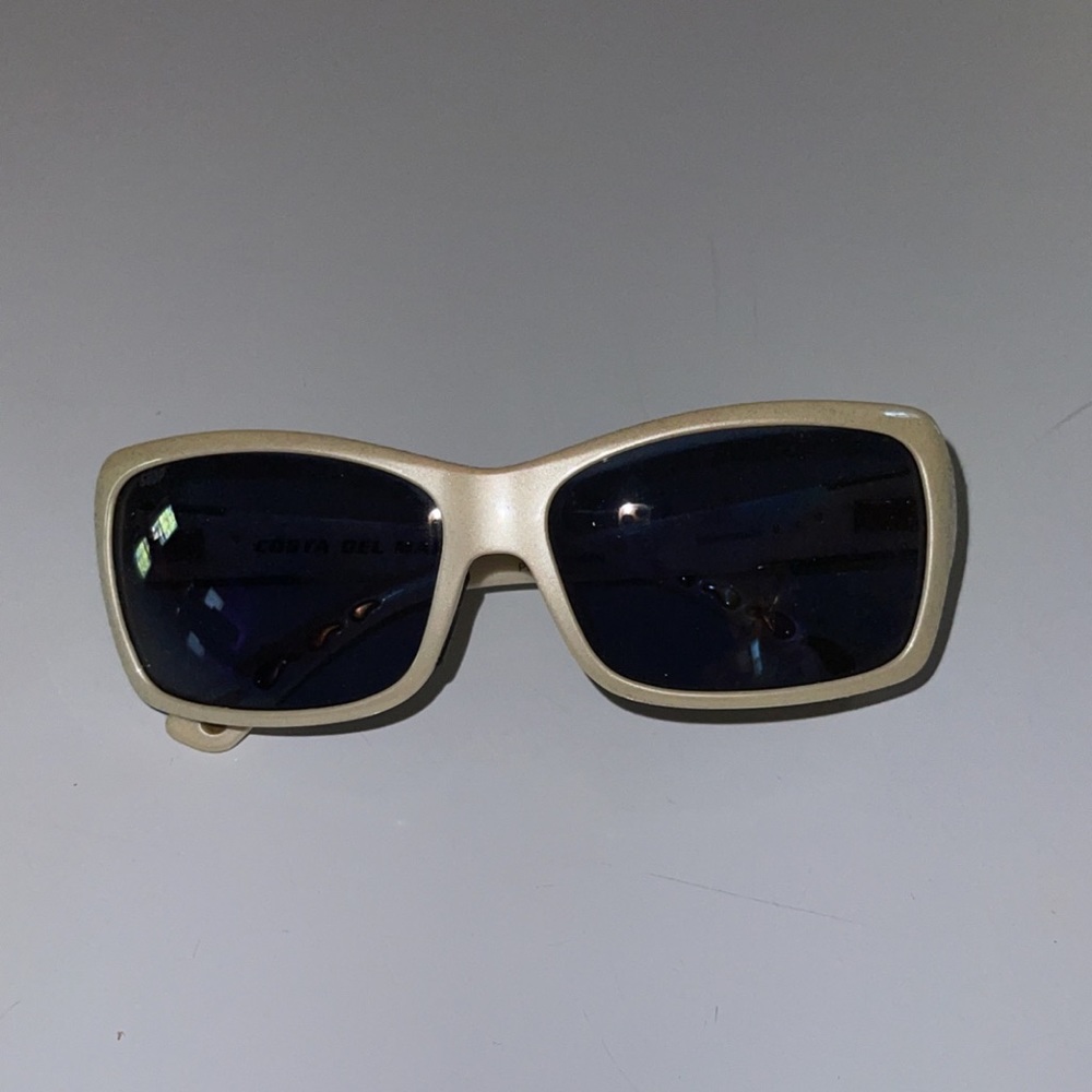 Pearl white Costa Del Mar sunglasses
